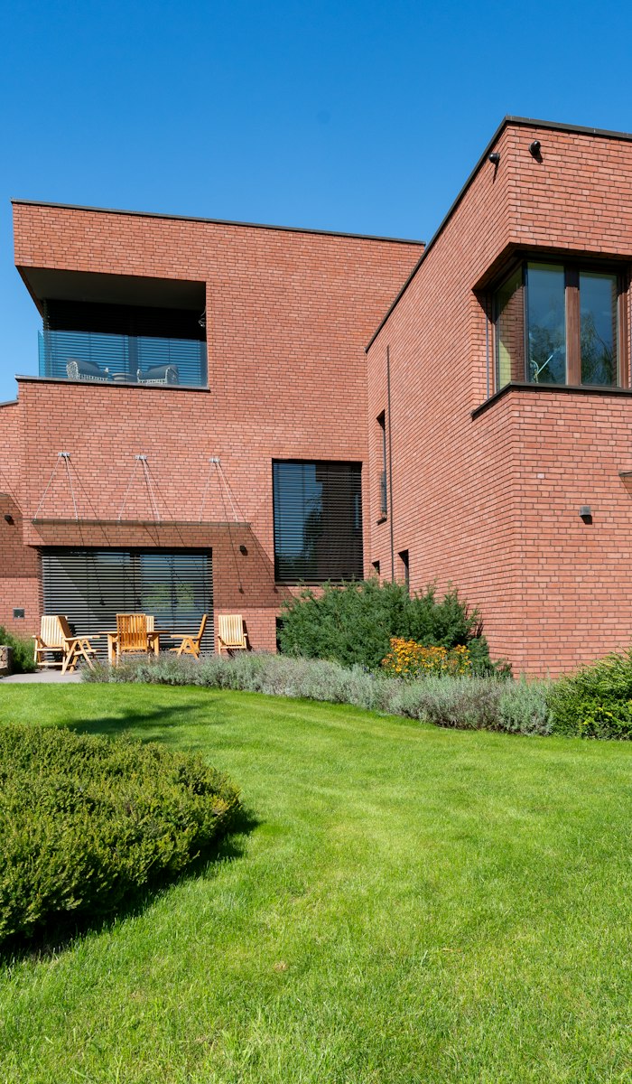 Completed contemporary brick house with garden